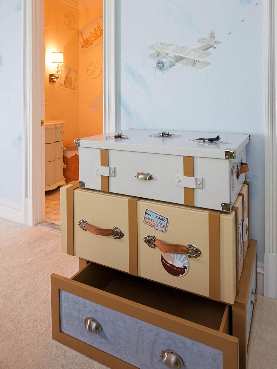 The drawers were designed to mimic luggage and a gas tank.