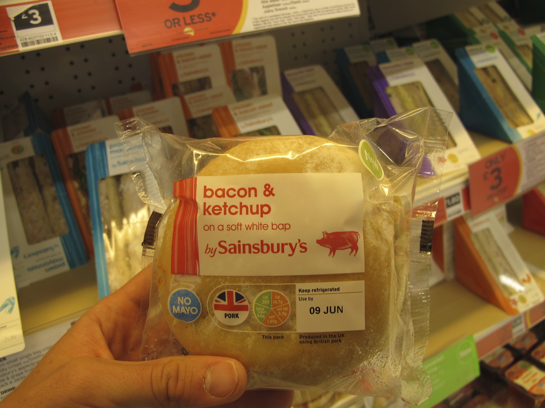 sainsbury's - Or Less tereno 42B Lot ughmane bacon & ketchup on a soft white bap by Sainsbury's Keep refrigerated Use by No Mayo 38914.79 ola satsat 5.99 salt 1.899 09 Jun Welog Pork This pack Produced in the Uk using British pork ole & grape true Drink