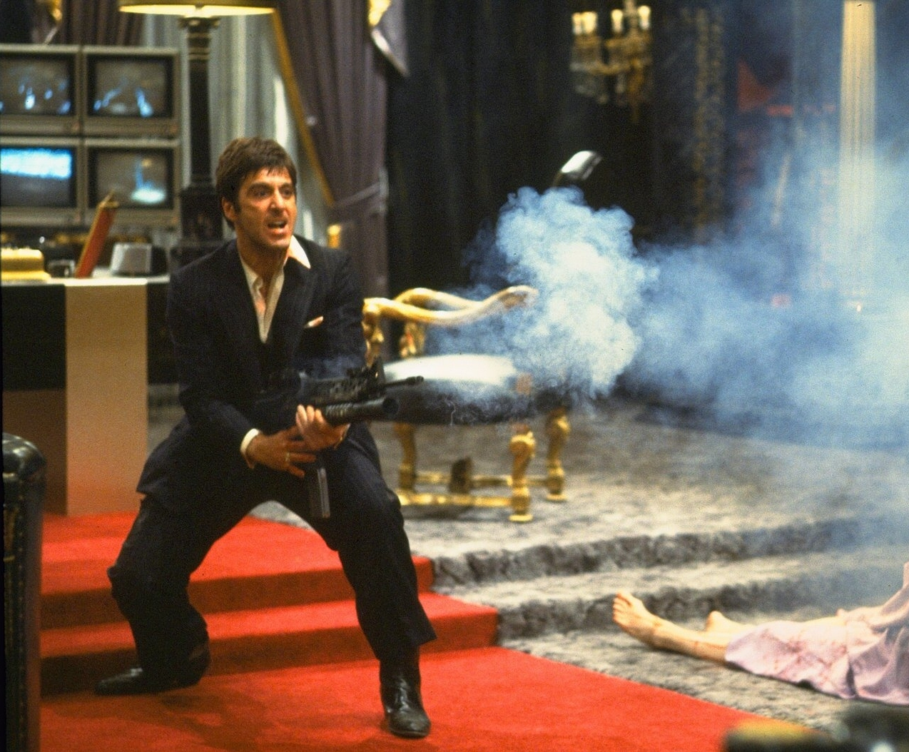 Scarface, Tony Montana dies in a epic gun battle in his  mansion  "Say hello to my little friend!"...