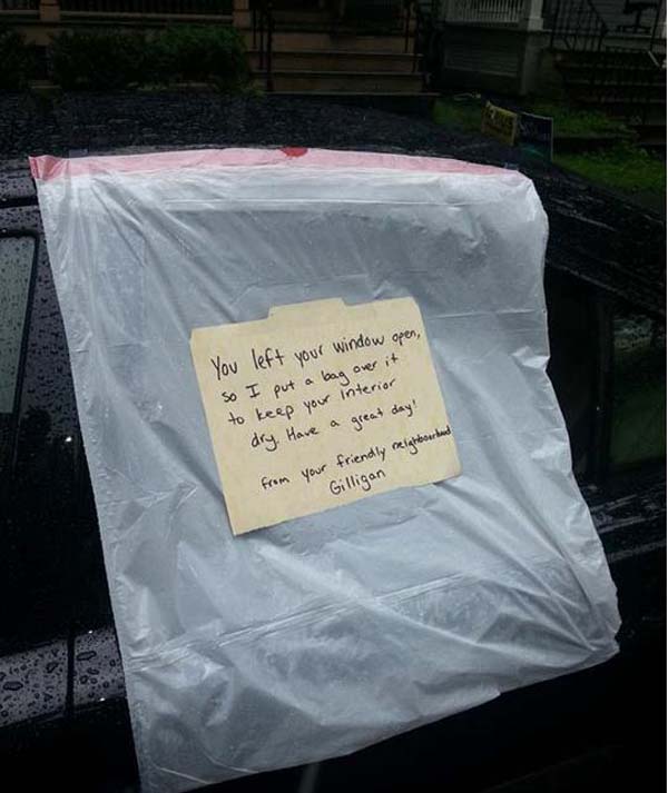 A rainstorm popped up, but this kind neighbor made sure this car didn't get soaked...