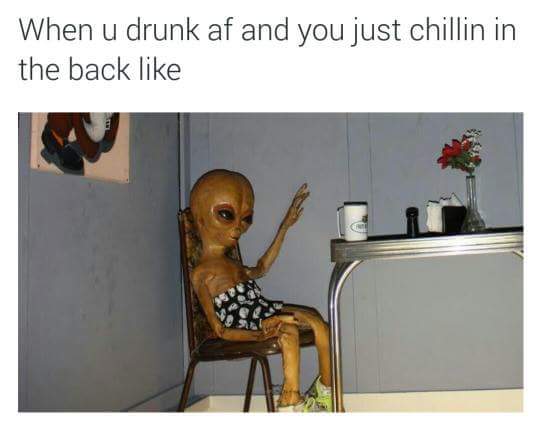 Tuesday meme about a drunk alien sitting in the corner