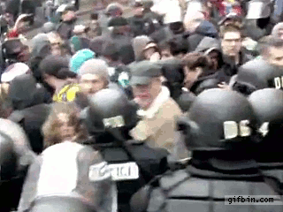 Thursday gif of protester getting pepper sprayed