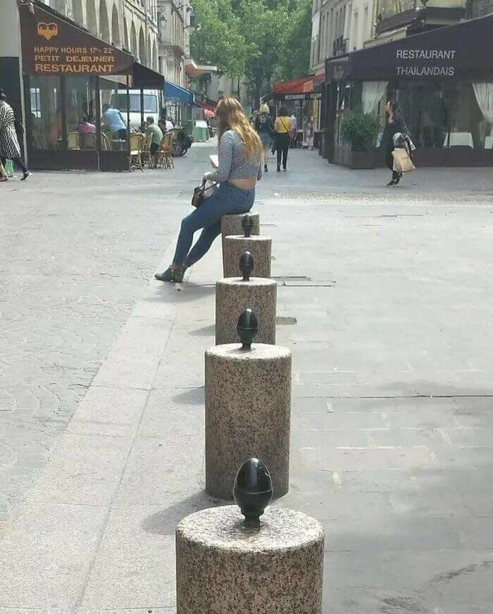 Tuesday Meme with pic of woman sitting on a stone that appears to have an uncomfortable fixture on top of it