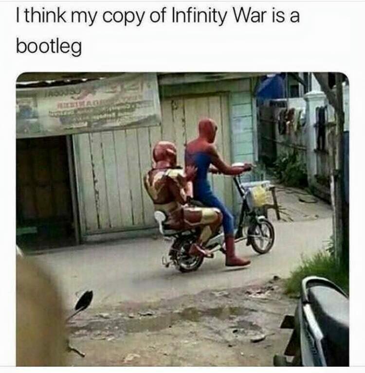 Savage Friday MEME about movie bootlegs with pic of Spider Man giving Iron Man a ride on his bike