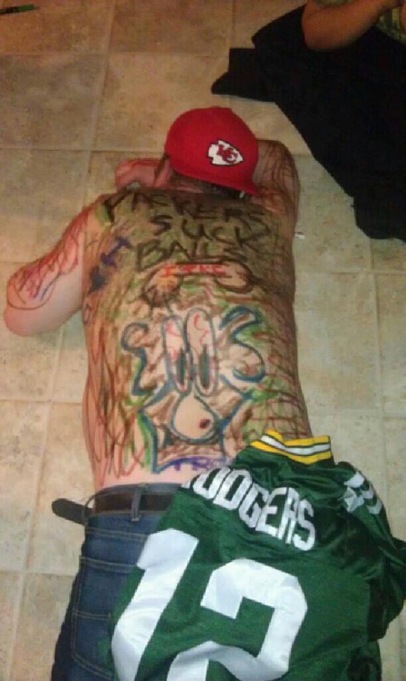 My Buddy rich is a Packers fan....Im a Chiefs Fan....He passed out....who wouldnt wipe Ass with his rodgers jersey....