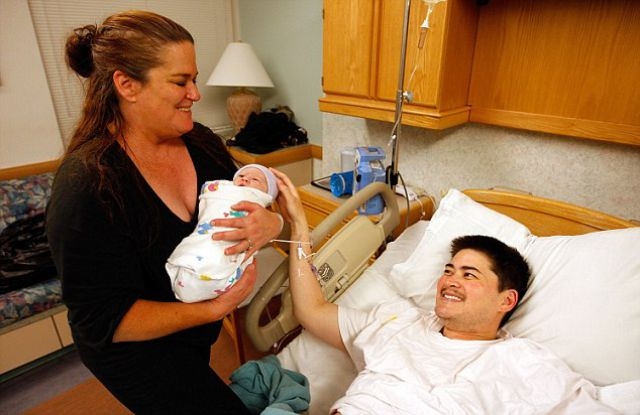 WORLDS FIRST LEGAL MAN GIVES BIRTH TO A CHILD