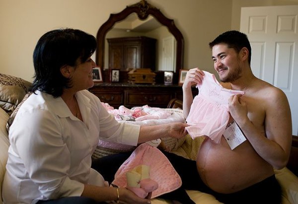 WORLDS FIRST LEGAL MAN GIVES BIRTH TO A CHILD