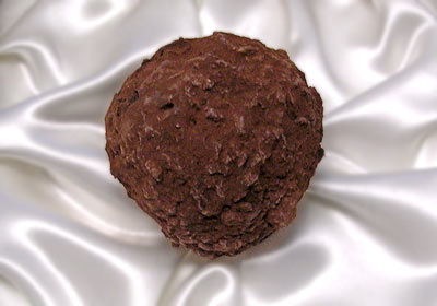 Chocopologie by Knipschildt. At $2,600 per pound, this handmade chocolate truffle is available only if ordered. t contains a black truffle and 70% Valrhona cacao
