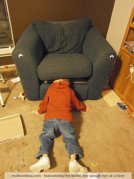 Boy devoured by hungry sofa