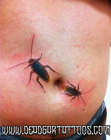 Tattooed roaches on stomach