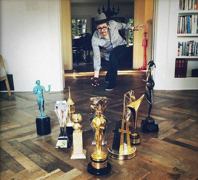 gary oldman with his awards