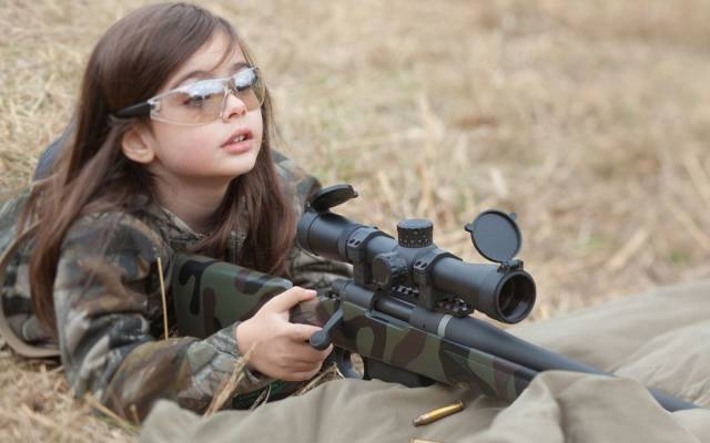 cute little girl with gun