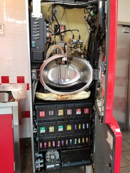 Here's what the inside of a soda dispenser looks like: