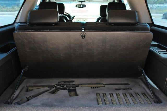 hidden gun compartment in car