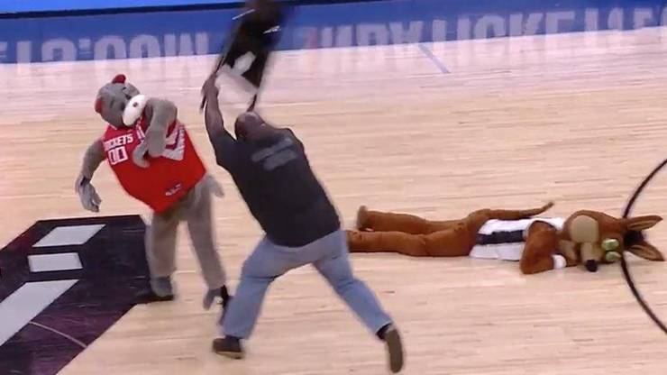 Cursed image of Guy hitting a mascot with an aluminum chair in the middle of a basketball court