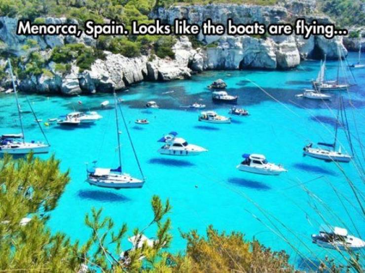 cala macarella - Menorca, Spain. Looks the boats are flying..
