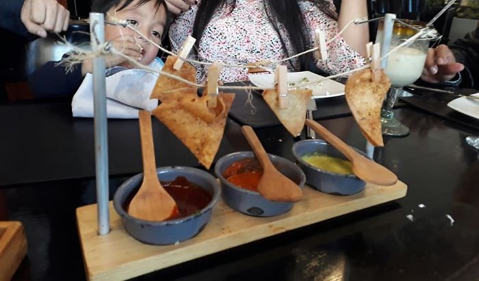 nachos hanging on a laundry line