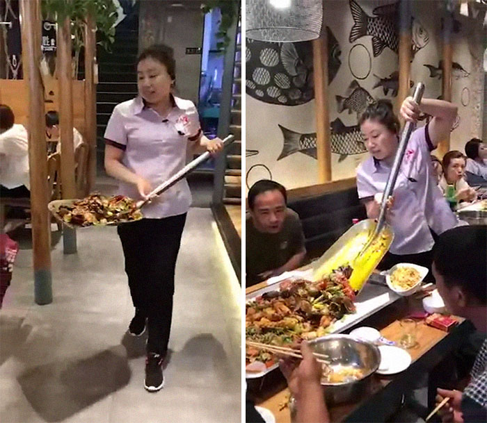 food in a restaurant  is brought on a shovel and put onto the table