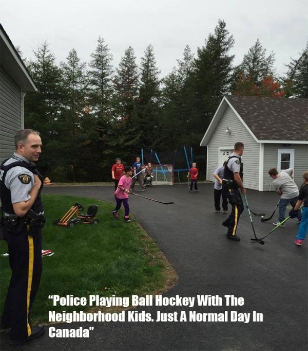 neighborhood kids playing - Police Playing Ball Hockey With The Neighborhood kids. Just A Normal Day In Canada"