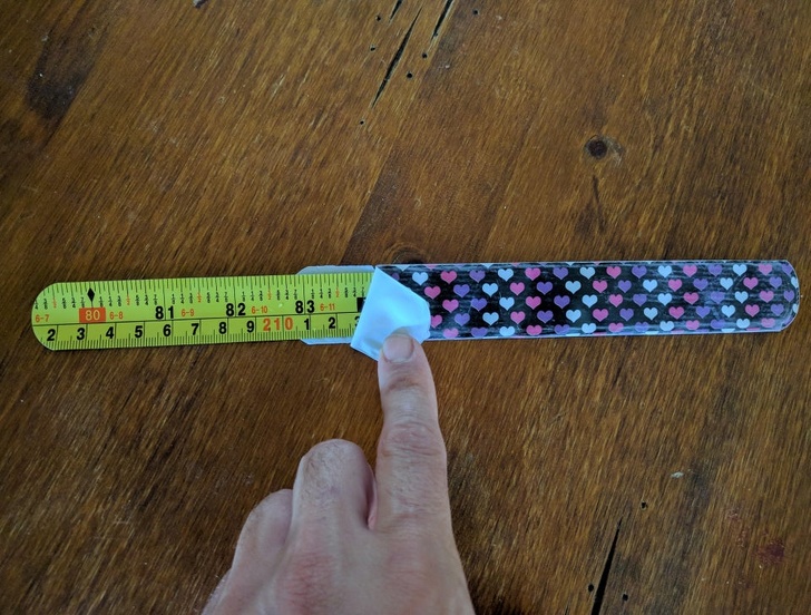 This slap bracelet was made from an old tape measure.
