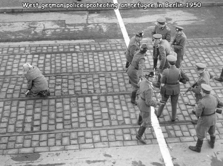 berlin 1955 - West german police protecting a refugee in Berlin 1950