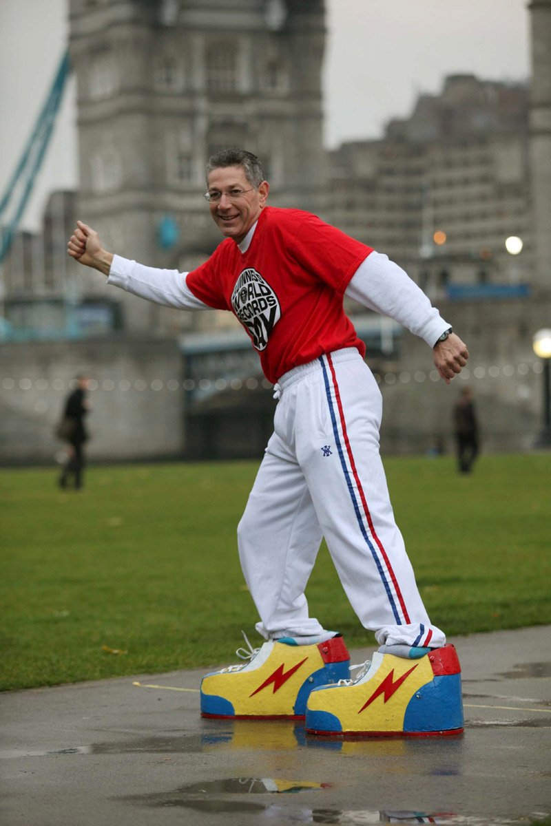 Walking Backwards in 440-pound Iron Shoes, fastest 10 meters, 32.72 seconds, New York, January 2012