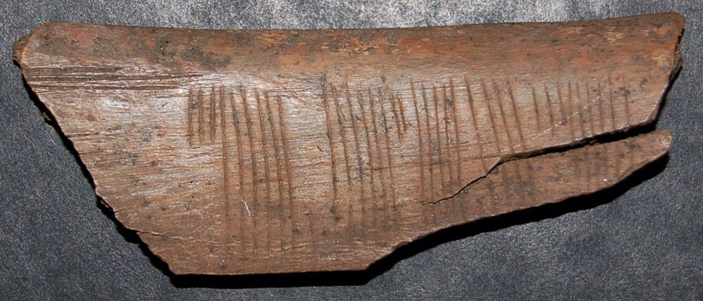 This is a 900-year-old viking message that translates to "Kiss me."