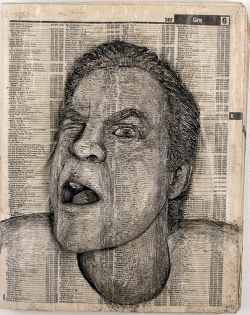 Portrait carved into a phone book
