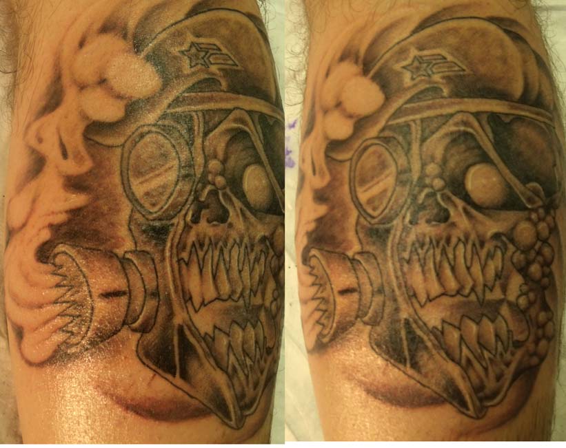a gas mask skull i drew up and tatted on my friend...custom
