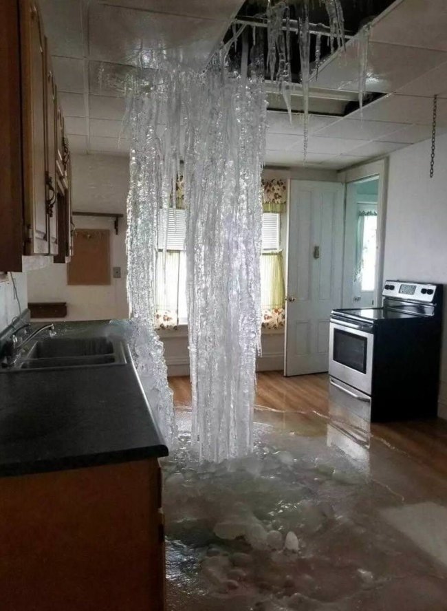 leak in a pipe floods the downstairs apartment and it freezes solid
