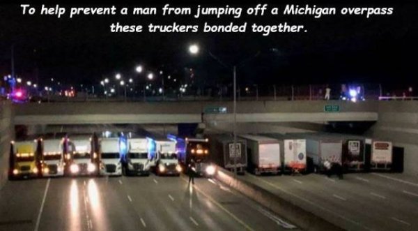 trucks stop suicide - To help prevent a man from jumping off a Michigan overpass these truckers bonded together.