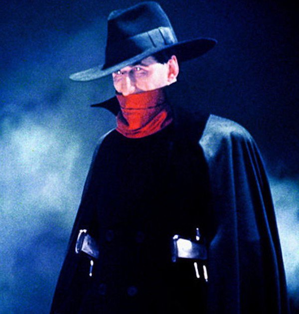 The Shadow (1994)
A few people remember that Alec Baldwin once played this pulp hero in a film adaptation. With the powers to hypnotize people to be invisible save for his shadow, this movie isn’t amazing, but it’s a great Saturday afternoon film, with a bag of Doritos and a mild hangover.