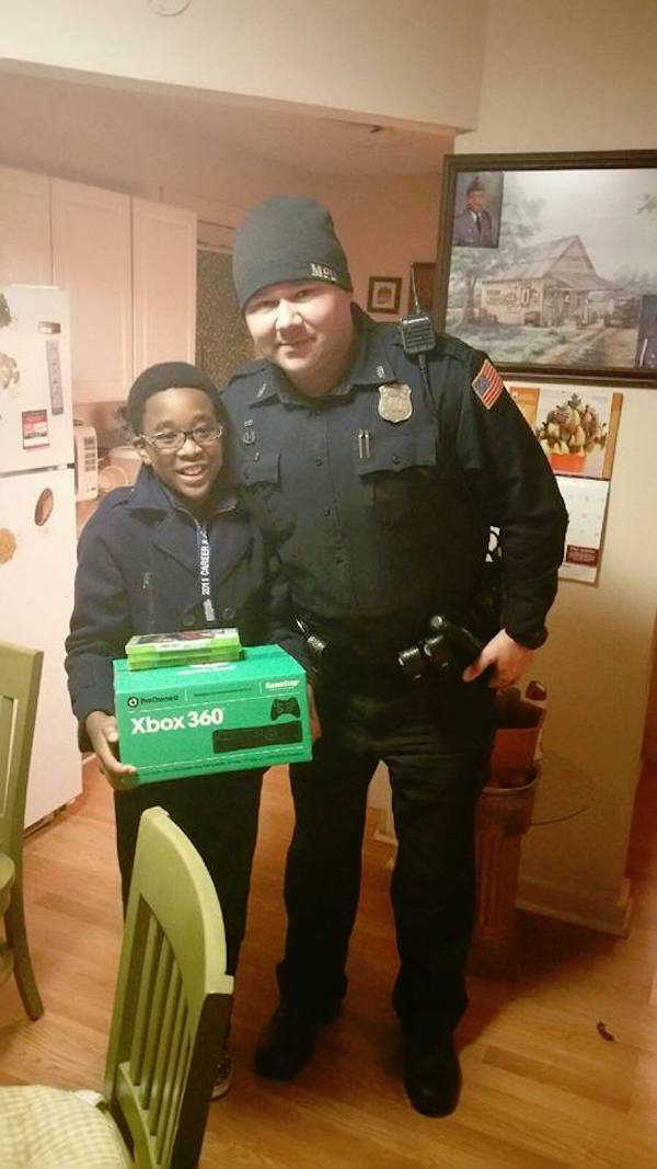 Knowing that they had to do something to help rectify the situation, officers Jerry Graves and Antonio Martin headed over to GameStop between calls and purchased a brand new system, along with a few games. They took the surprise gifts to Campbell’s home and asked if they were his. Naturally, he said no. Once the officers explained that it was in fact his, he and his mother broke into tears. The officers’ incredible gesture, while simple, left a little boy elated, and reminded us of the true nature of Christmas.