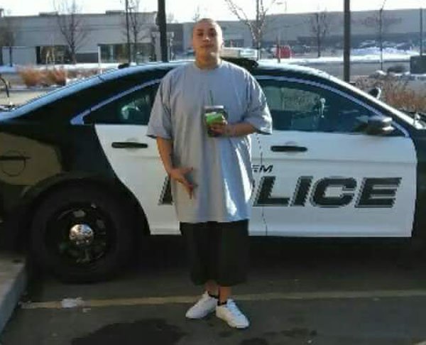 This wannabe gangster wanted to get the attention of the police and succeeded, landing his ass in jail. After taking a photo of himself in front of a police car flashing gang signs, this road scholar decides to taunt the police by posting it on Facebook. The response from the police was classic...