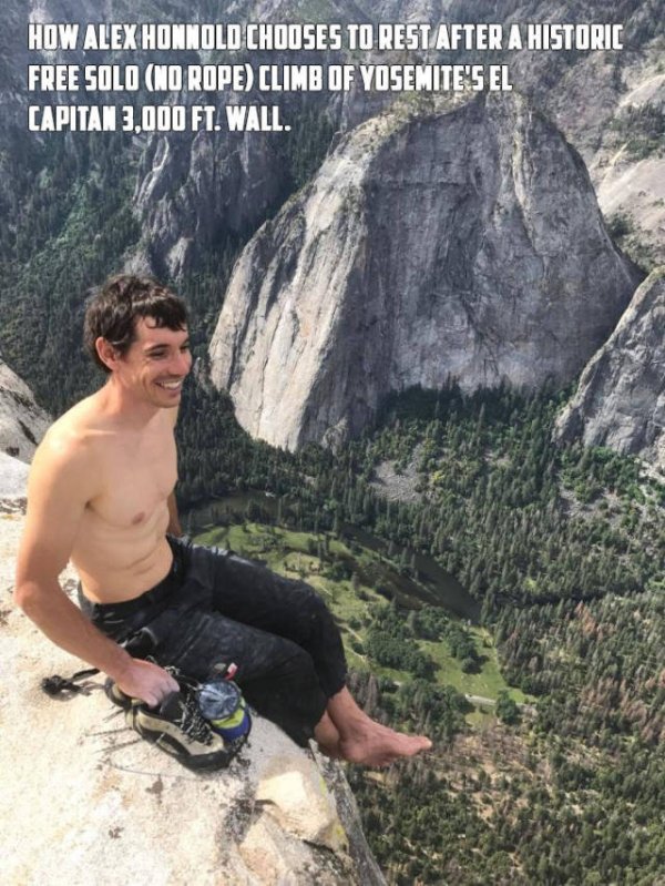 Dude who climbed a huge rock wall relaxing after the climb.