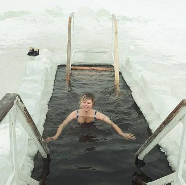 Russian Girls Celebrate Orthodox Epiphany By Diving Into Icy Cold Water