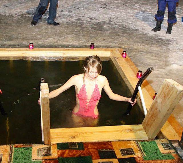 Russian Girls Celebrate Orthodox Epiphany By Diving Into Icy Cold Water