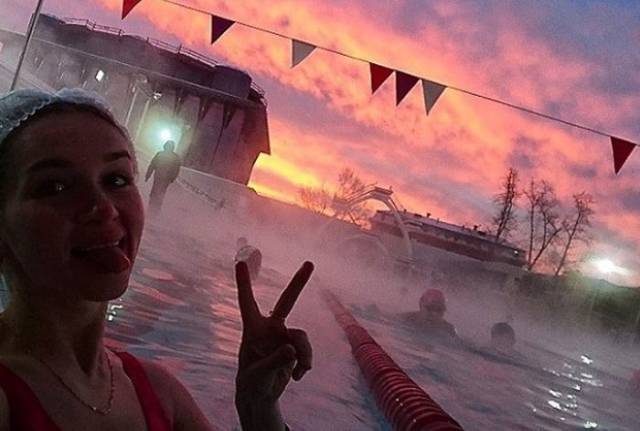 Russian Girls Celebrate Orthodox Epiphany By Diving Into Icy Cold Water