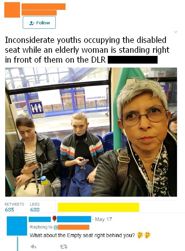 liars - inconsiderate youths occupying the disabled seat - Inconsiderate youths occupying the disabled seat while an elderly woman is standing right in front of them on the Dlr | 685 688 May 17 @ What about the Empty seat right behind you? te