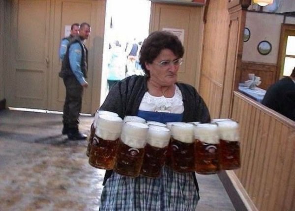 woman carrying beer