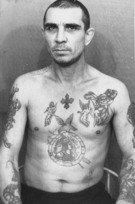 In jails and prisons around the world, tattoos can become a significant part of an inmate’s uniform, not only marking the crime they’re in for but also serving as a way to communicate with others. In Russia, for instance, a dagger through the neck suggests that an inmate has murdered someone in prison and is available to carry out hits for others-meaning, if you see that guy walking toward your cell  you should run the fuck away.The tattoos on this inmate mimic those of higher ranking criminals. They indicate the bearer has adopted a thief’s mentality. However, he does not wear the ‘thief’s stars;’ he is not a ‘vor v zakone’ or ‘thief-in-law,’ and therefore holds no real power among this caste.