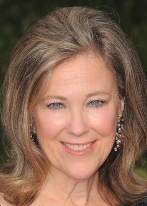 Catherine O'Hara has Situs Inversus, a congenital condition where all the major visceral organs are reversed- i.e., heart on the right, liver on the left, etc.