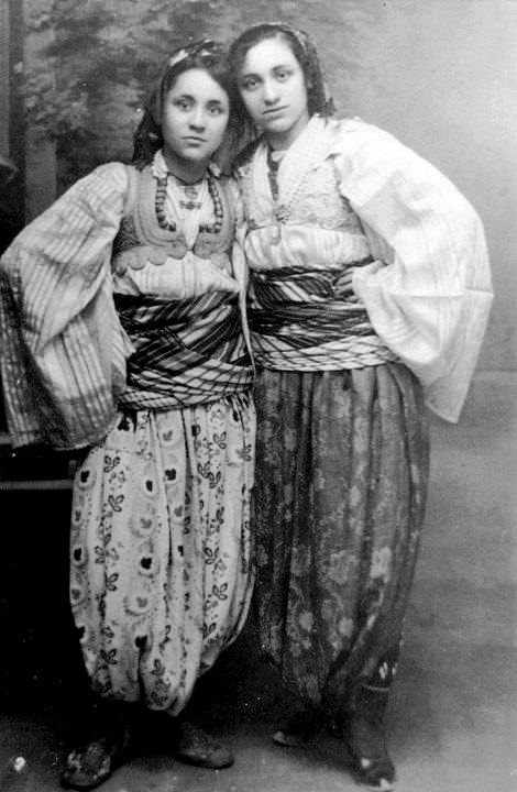MOTHER TERESA 1910-1997 as a teen in native Albanian clothing.