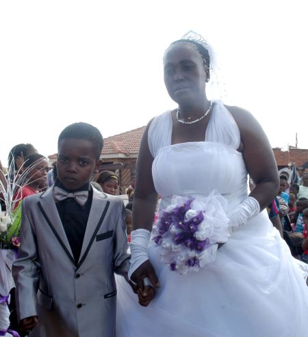 8 Year-Old Boy Marries 61 Year-Old Woman!