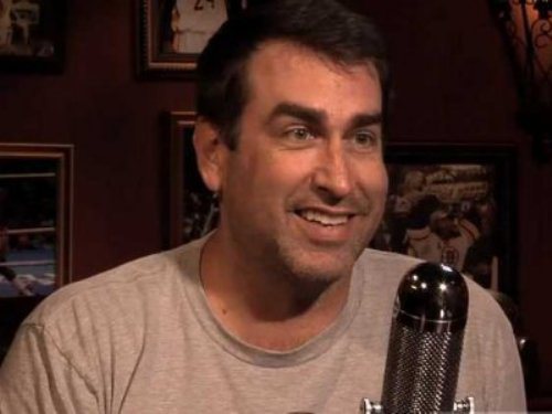 Rob Riggle played many memorable characters. Riggle was on Saturday Night Live, and if you remember him from that, then you probably remember him playing Larry the Cable Guy, Howard Dean, or Toby Keith.