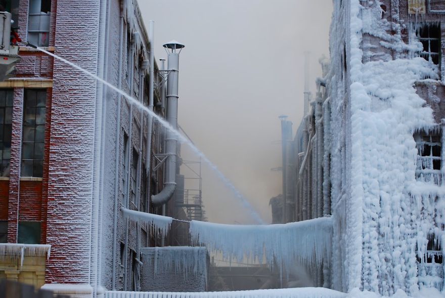 While Firemen Were Putting Out A Fire In Chicago, The Water Froze And Coated Everything In Ice. Chicago, Illinois