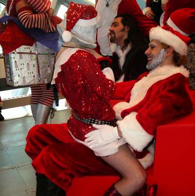 Lapdance Santa. It’s a shame when children take a back seat on Santa’s priorty list to getting his junk grinded on by Mrs. Claus.