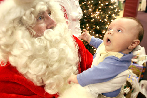 Bad with Baby Santa. You have no business in this profession if you hold an infant like a ticking timebomb. Act like you’ve been here before.
