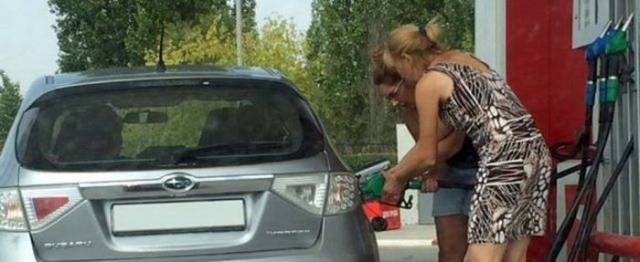 woman driving gas pumping fails