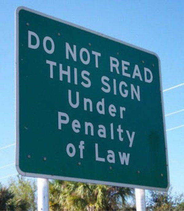 contradiction examples - Do Not Read This Sign Under Penalty of Law